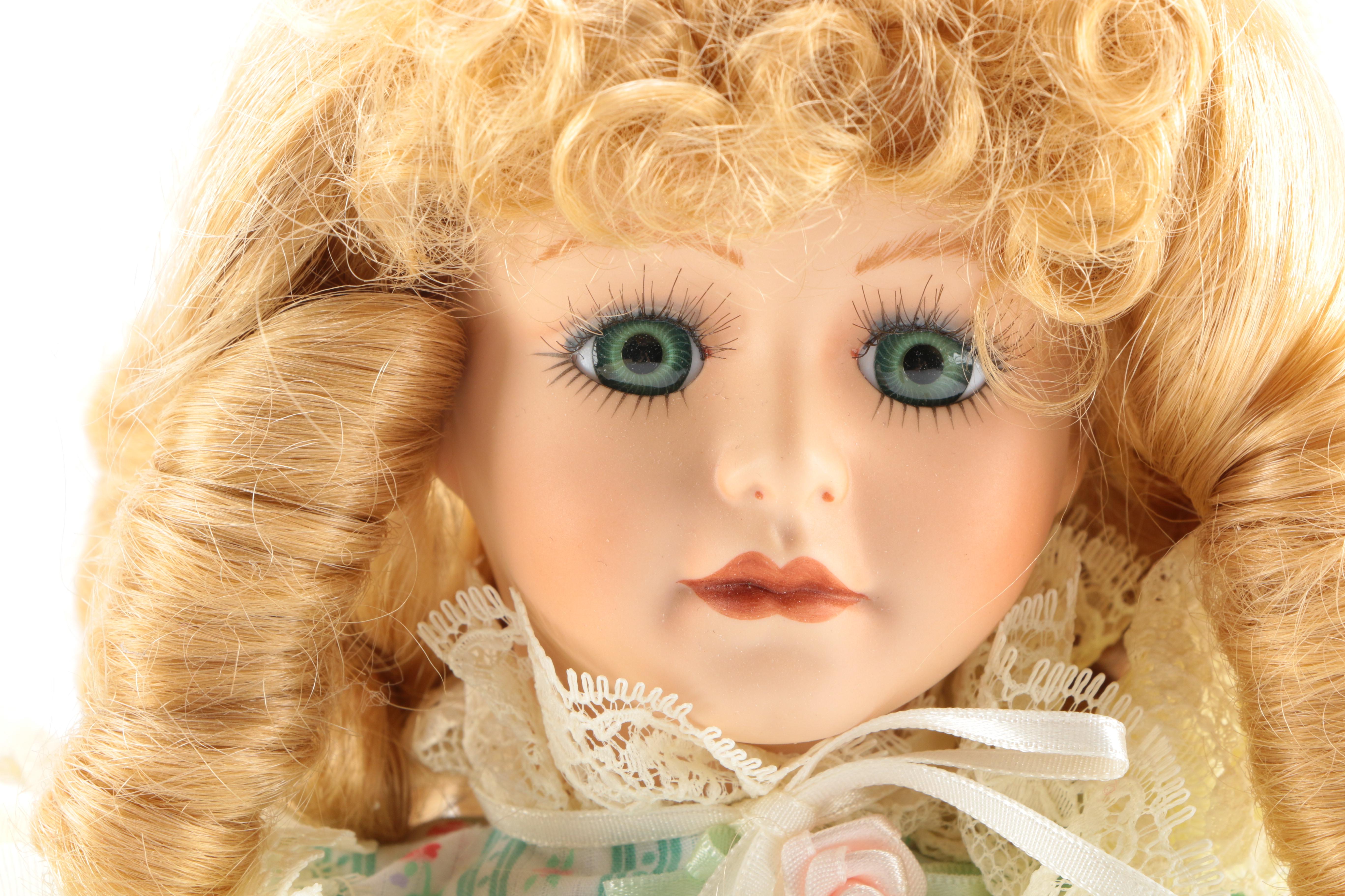 Pair of Porcelain Dolls