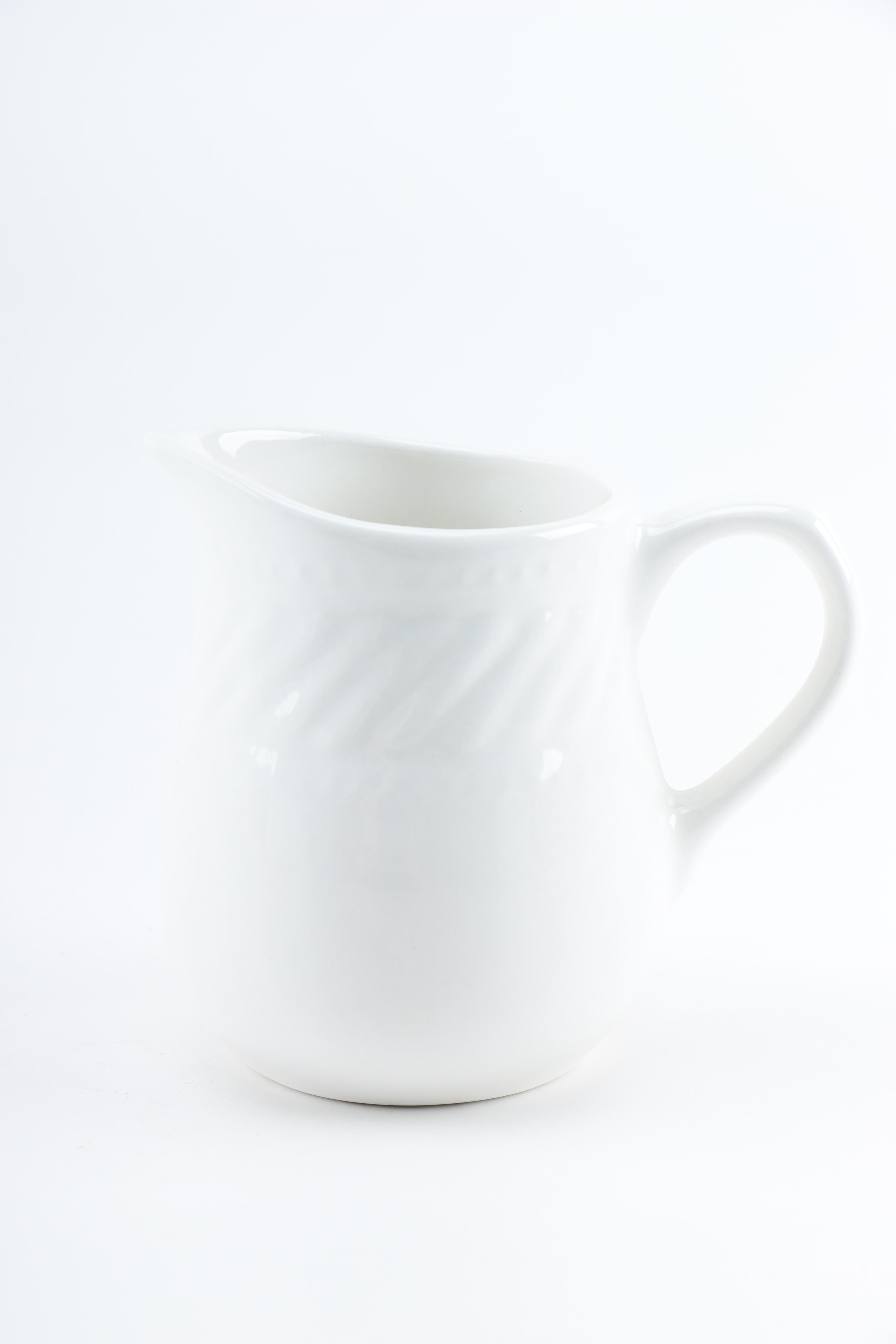 White Bowls and Creamer and Sugar Set by Gibson Housewares