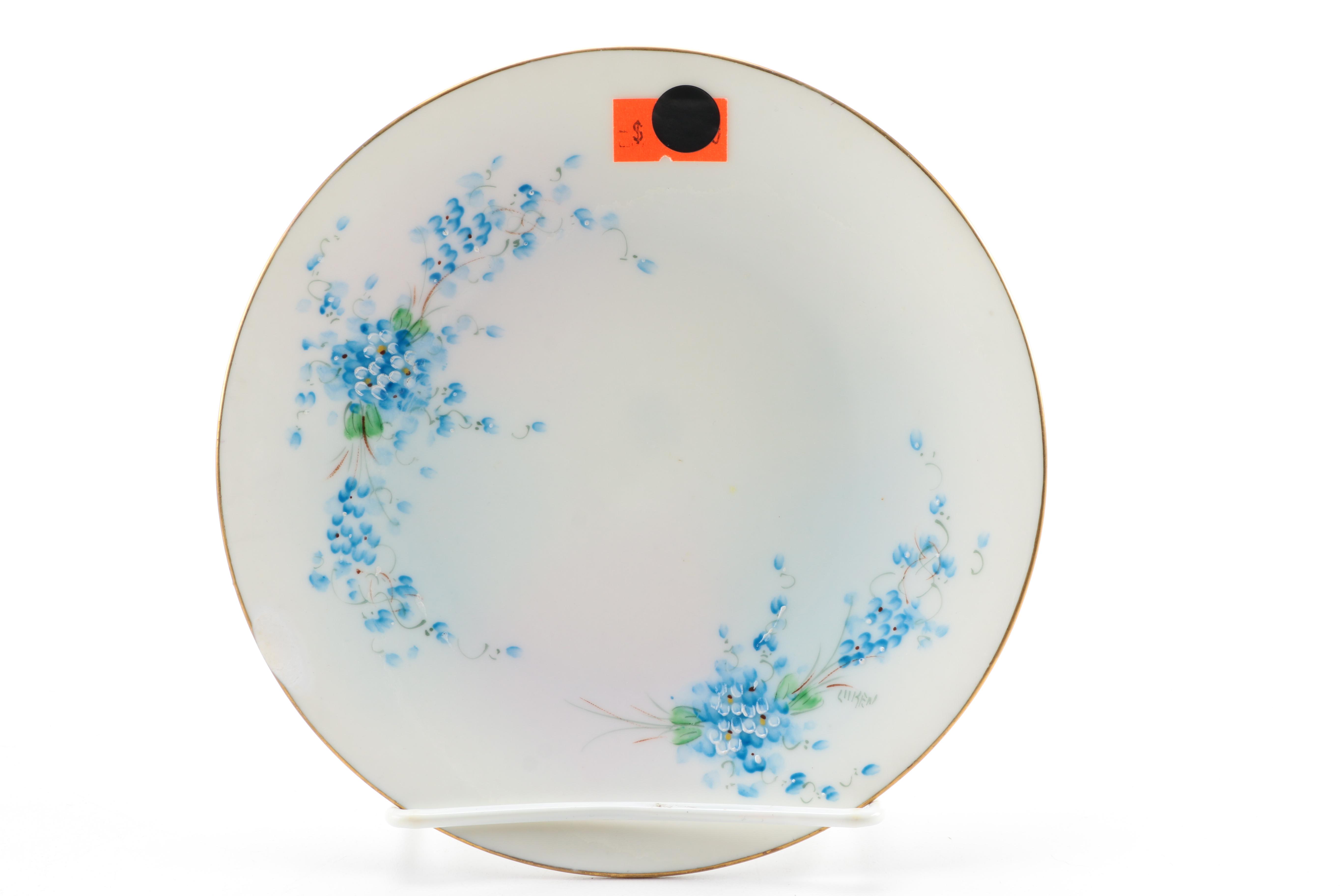 Assorted Saucers and Teacup