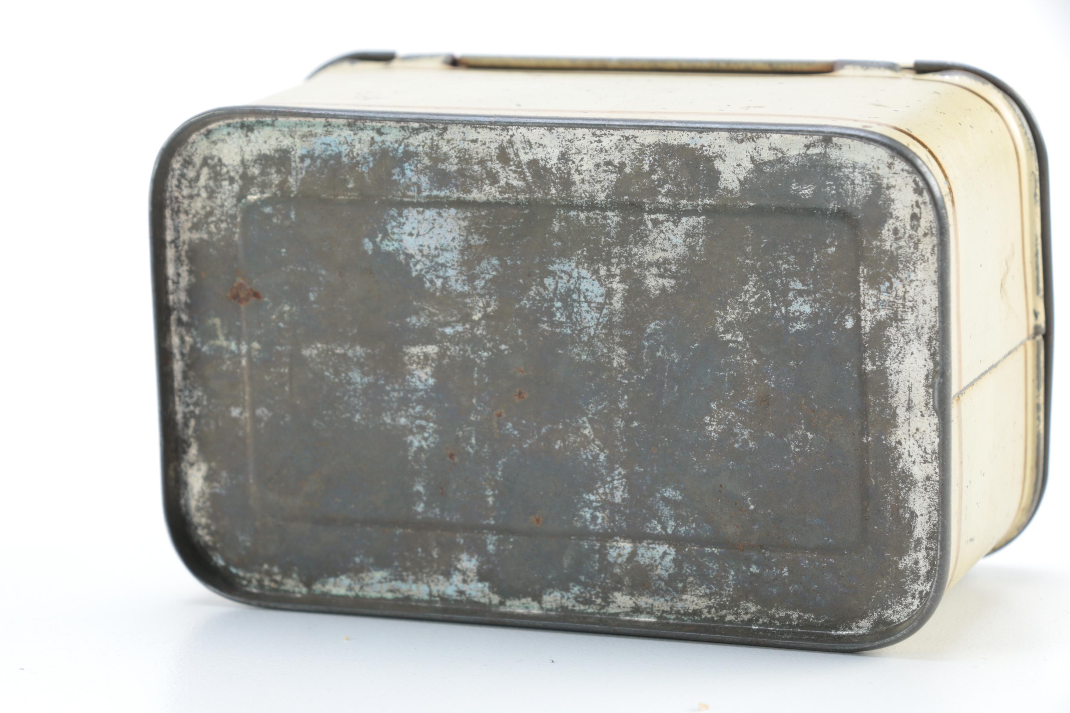 Porcelain Doll with Religious Books and Tin Container