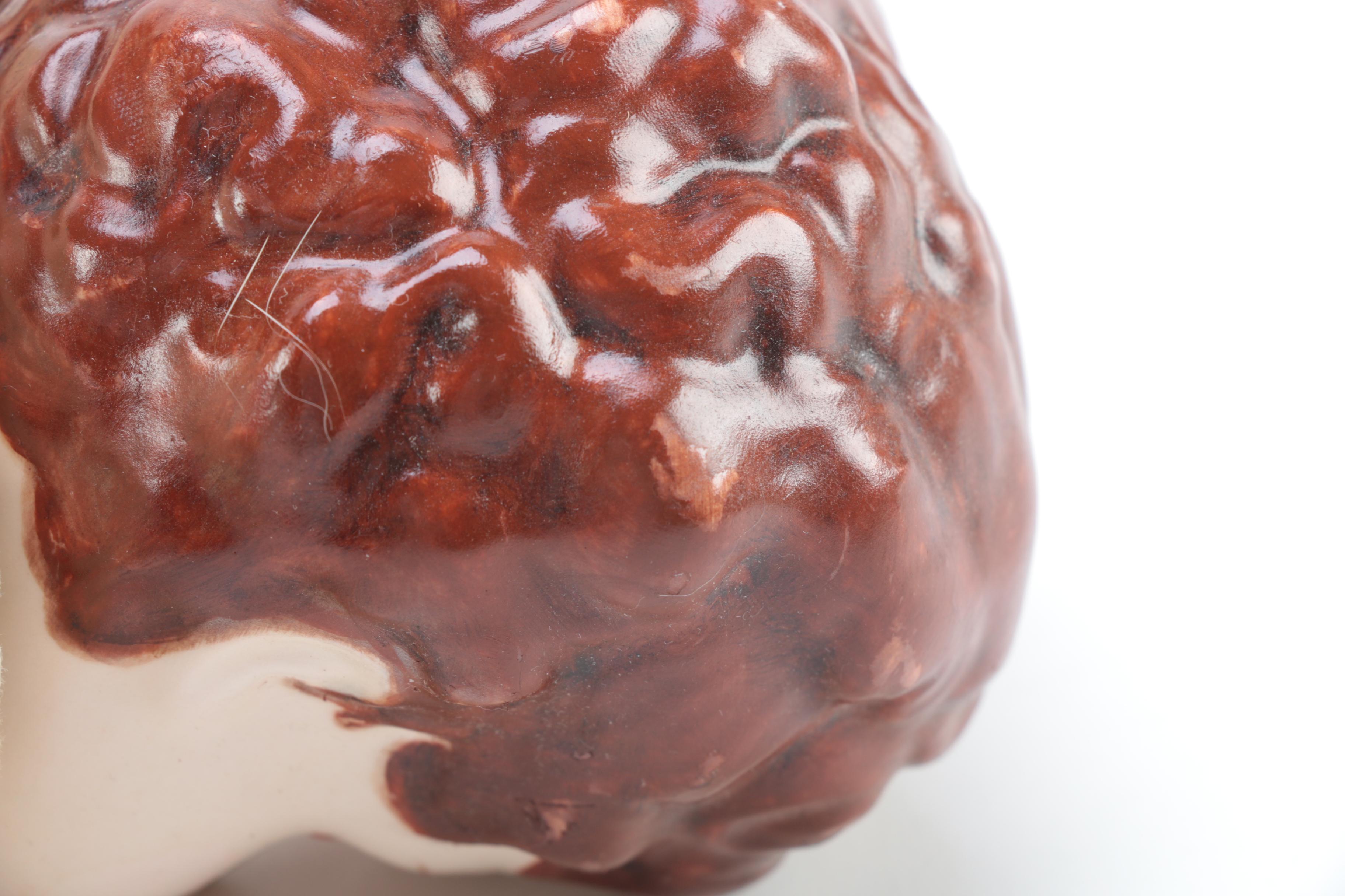 Porcelain Doll with Religious Books and Tin Container