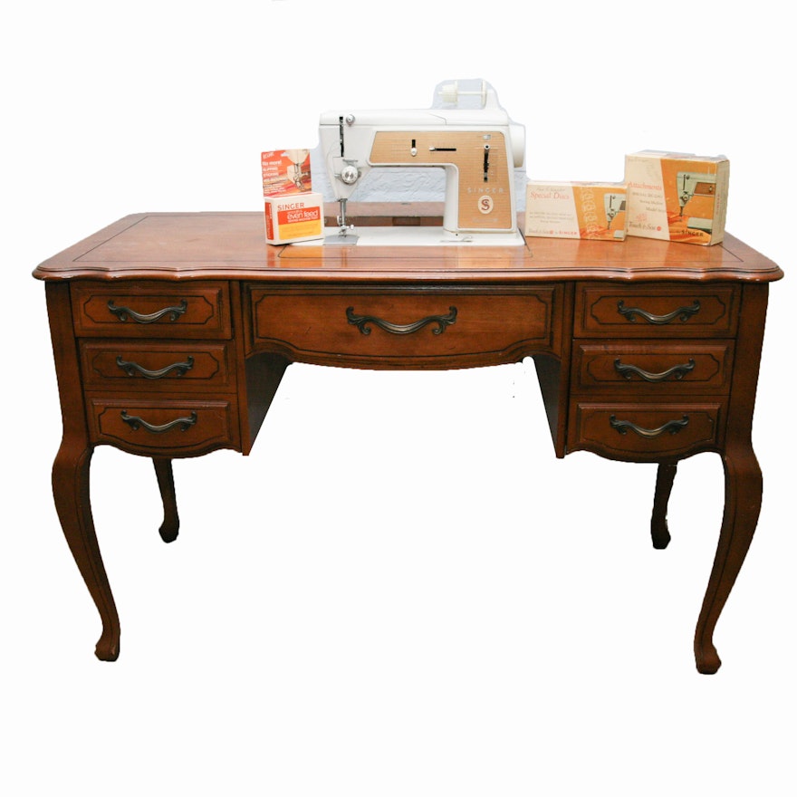 Singer Sewing Machine with Accessories in Wooden Desk