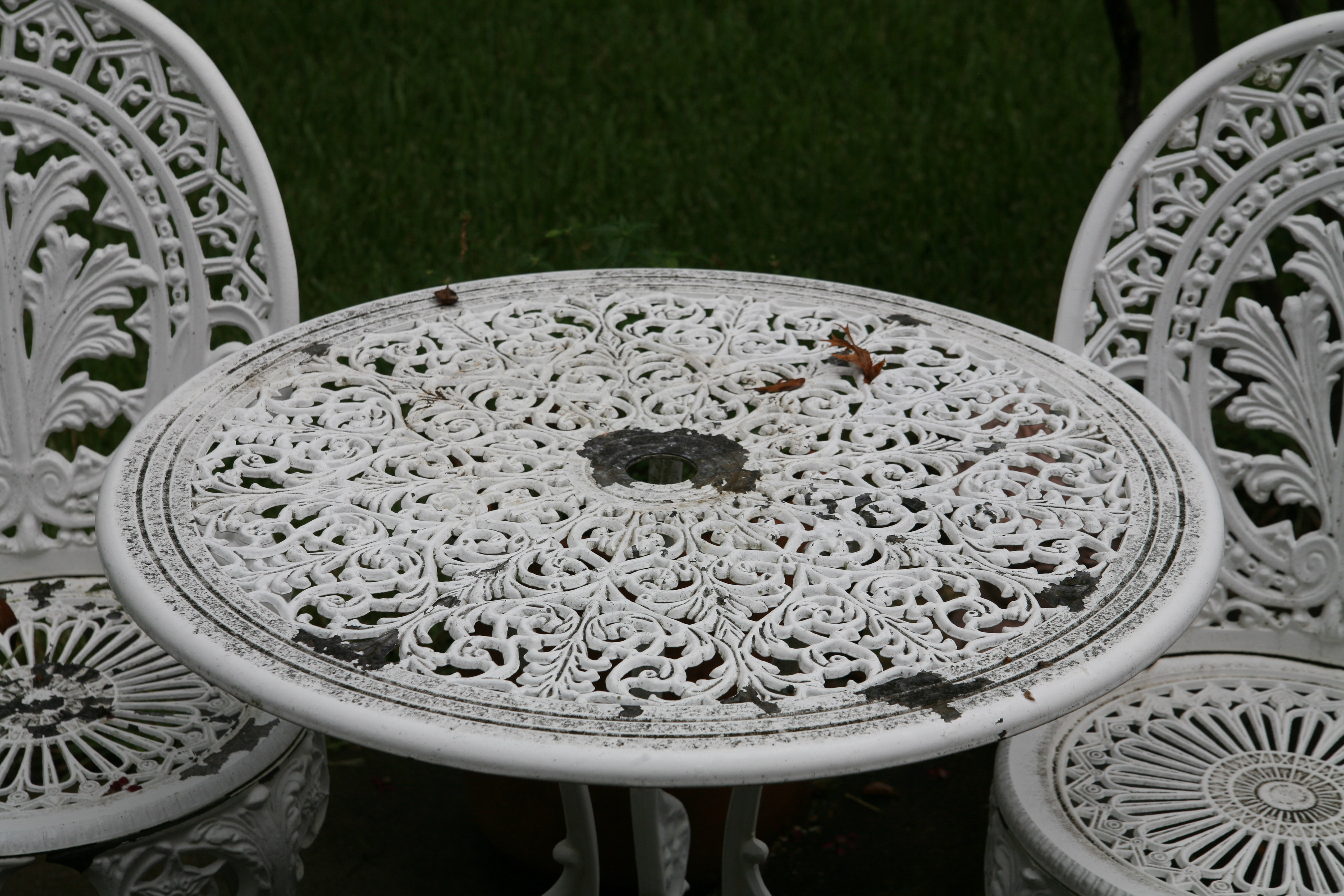 White Cast Iron Patio Table and Chairs