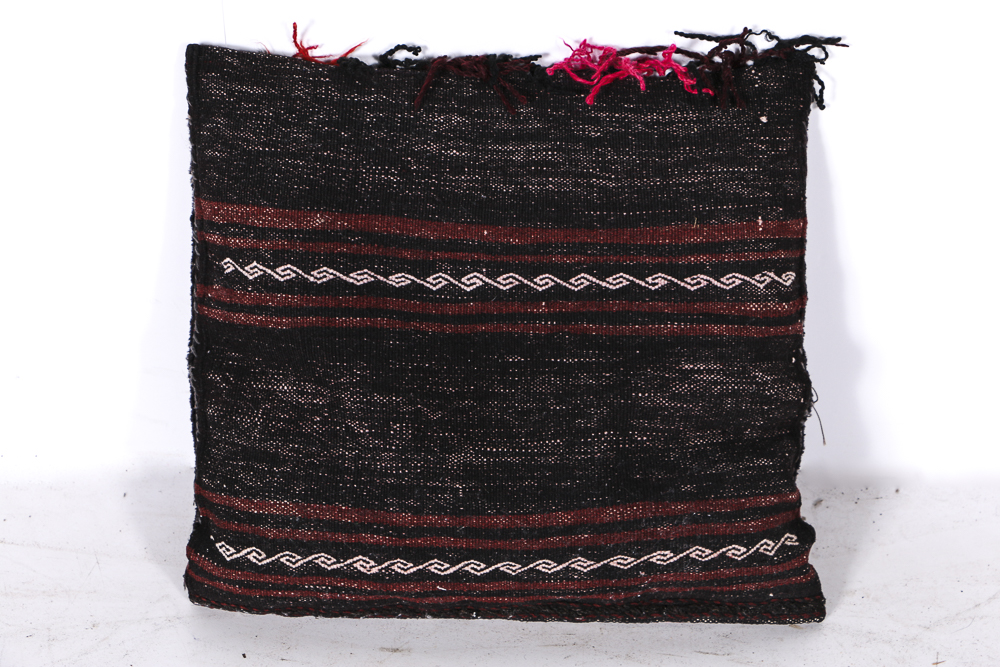 Four Wool Rug Accent Pillows and Woven Textile