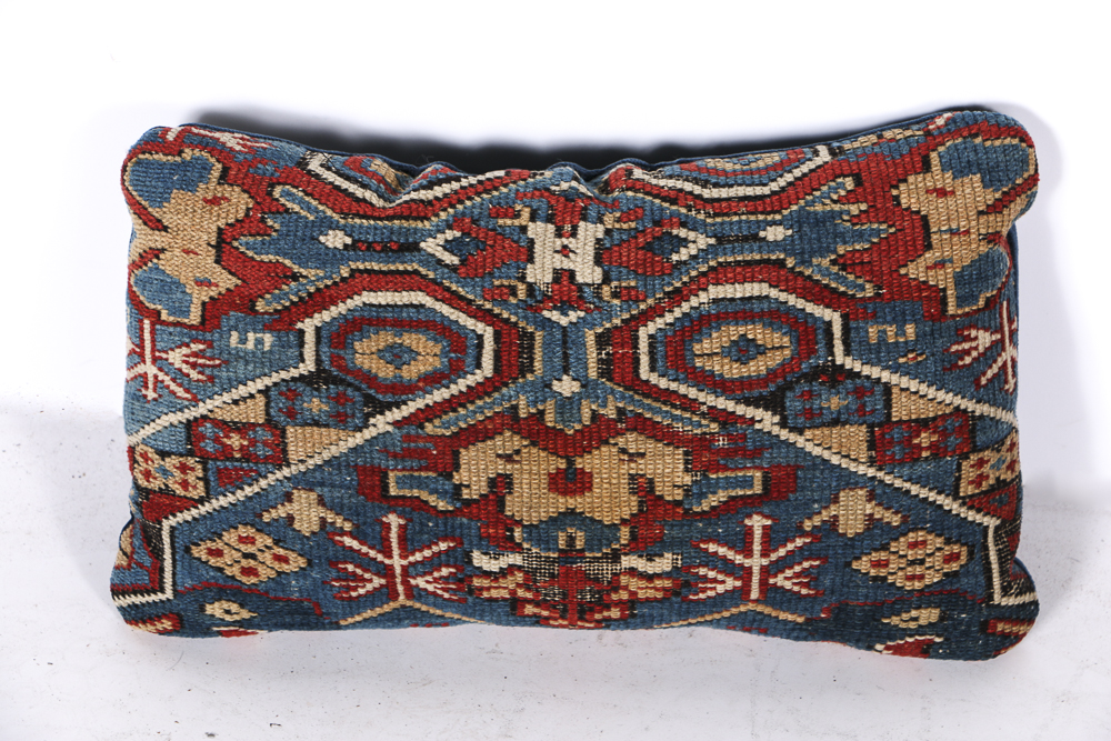 Four Wool Rug Accent Pillows and Woven Textile