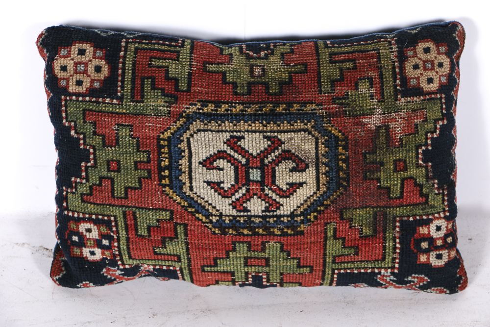 Four Wool Rug Accent Pillows and Woven Textile