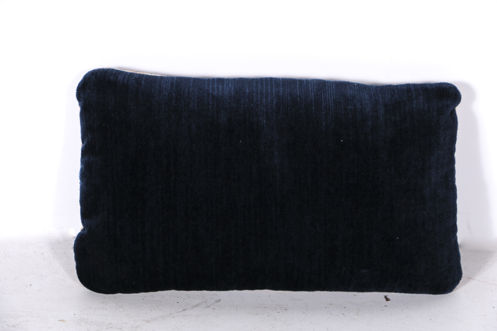 Four Wool Rug Accent Pillows and Woven Textile