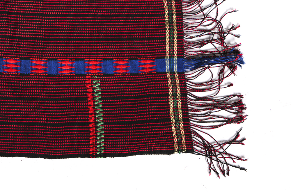 Four Wool Rug Accent Pillows and Woven Textile