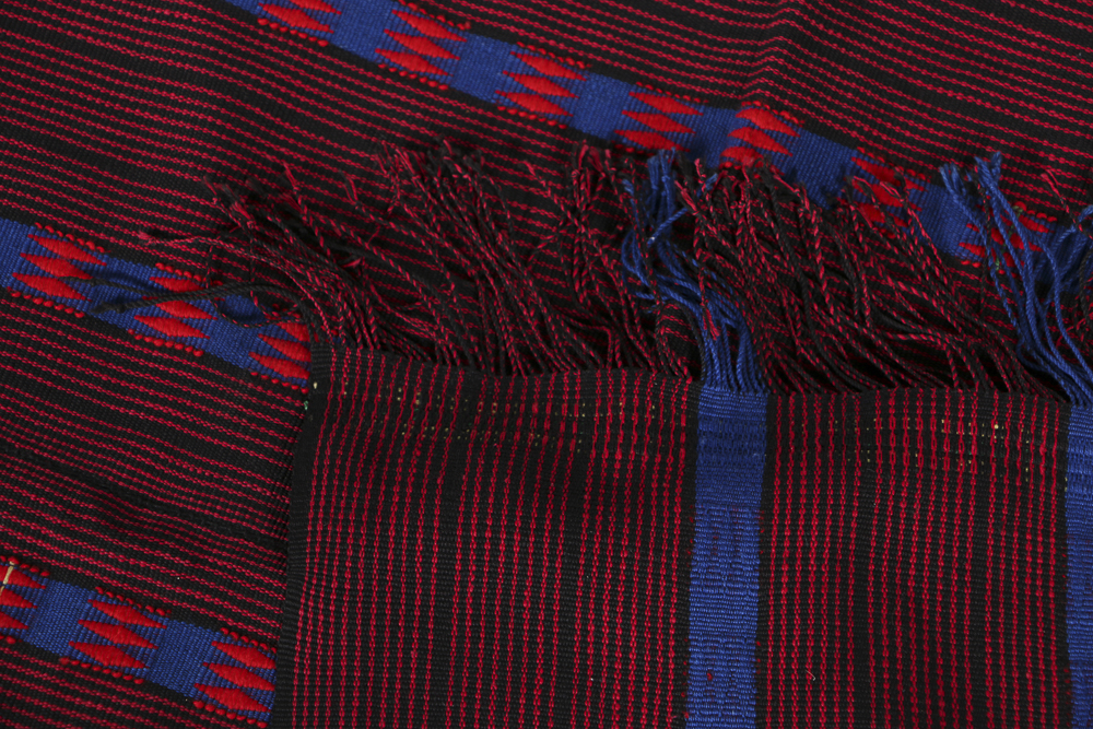 Four Wool Rug Accent Pillows and Woven Textile