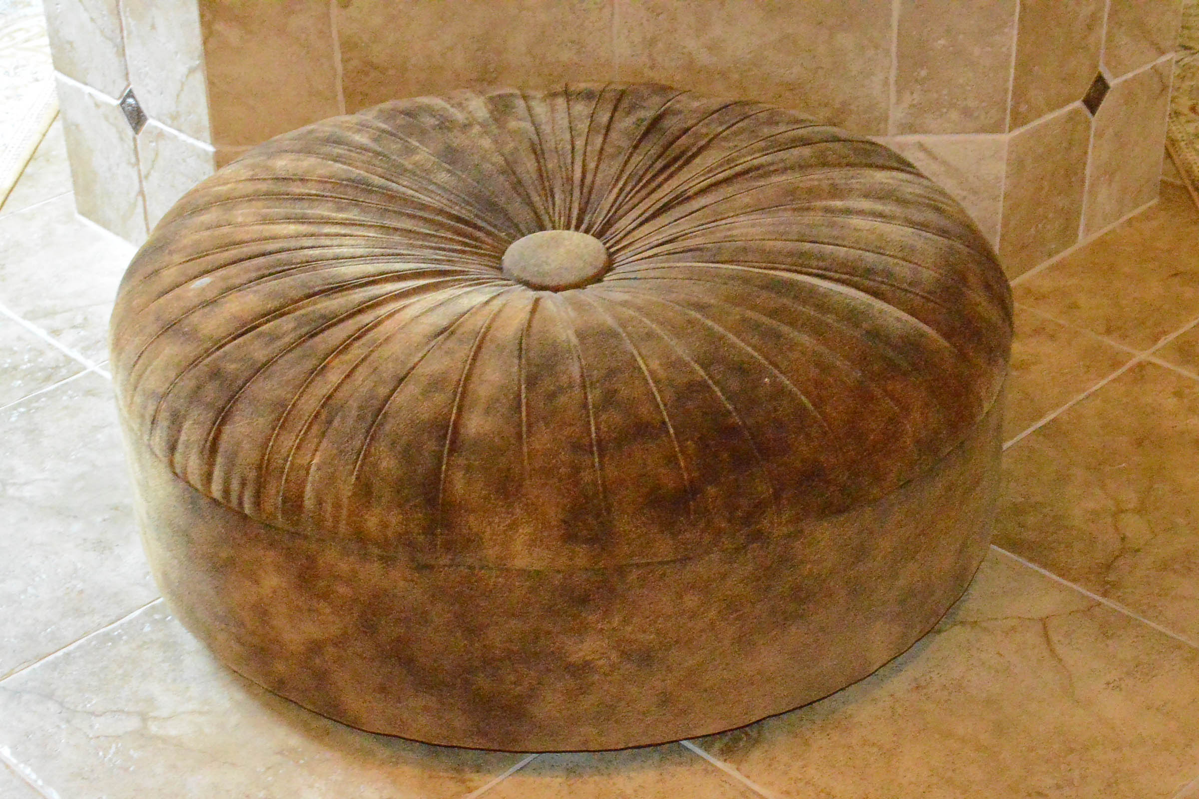Round Tufted Brown Ottoman