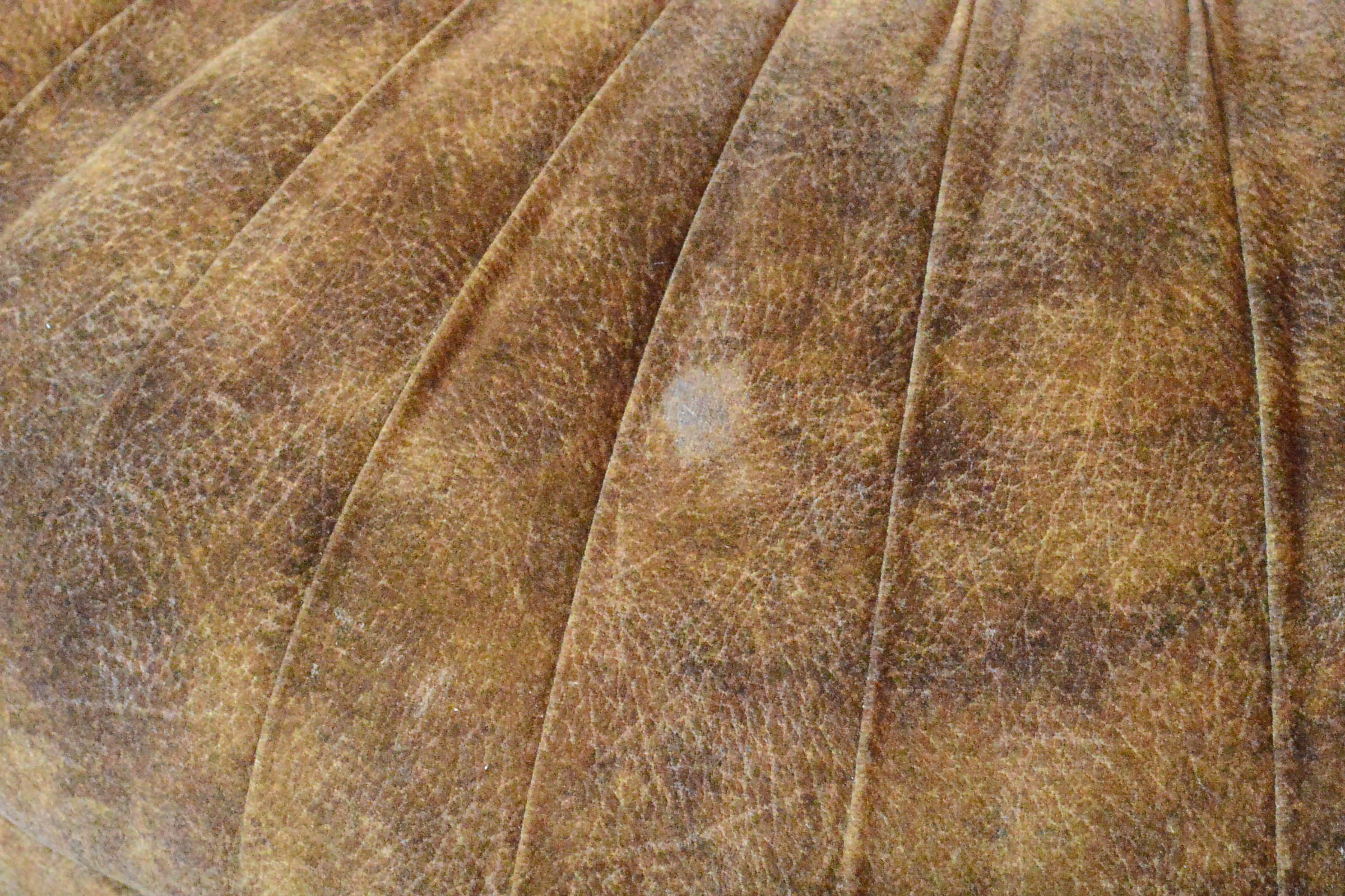 Round Tufted Brown Ottoman