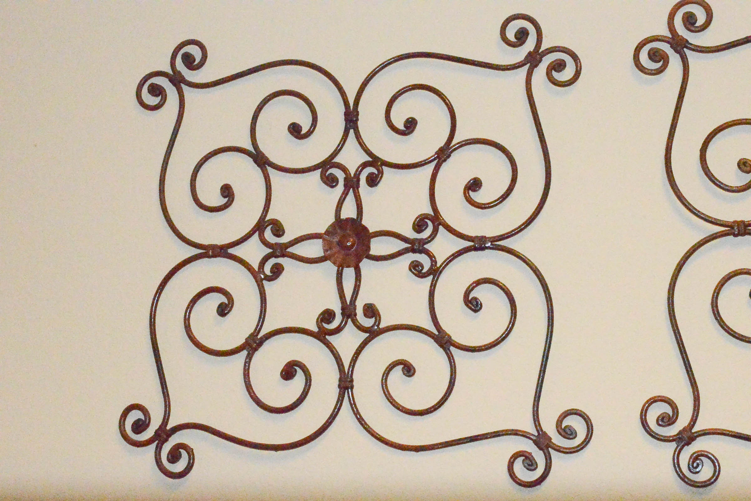 Pair of Wrought Metal Wall Hangings