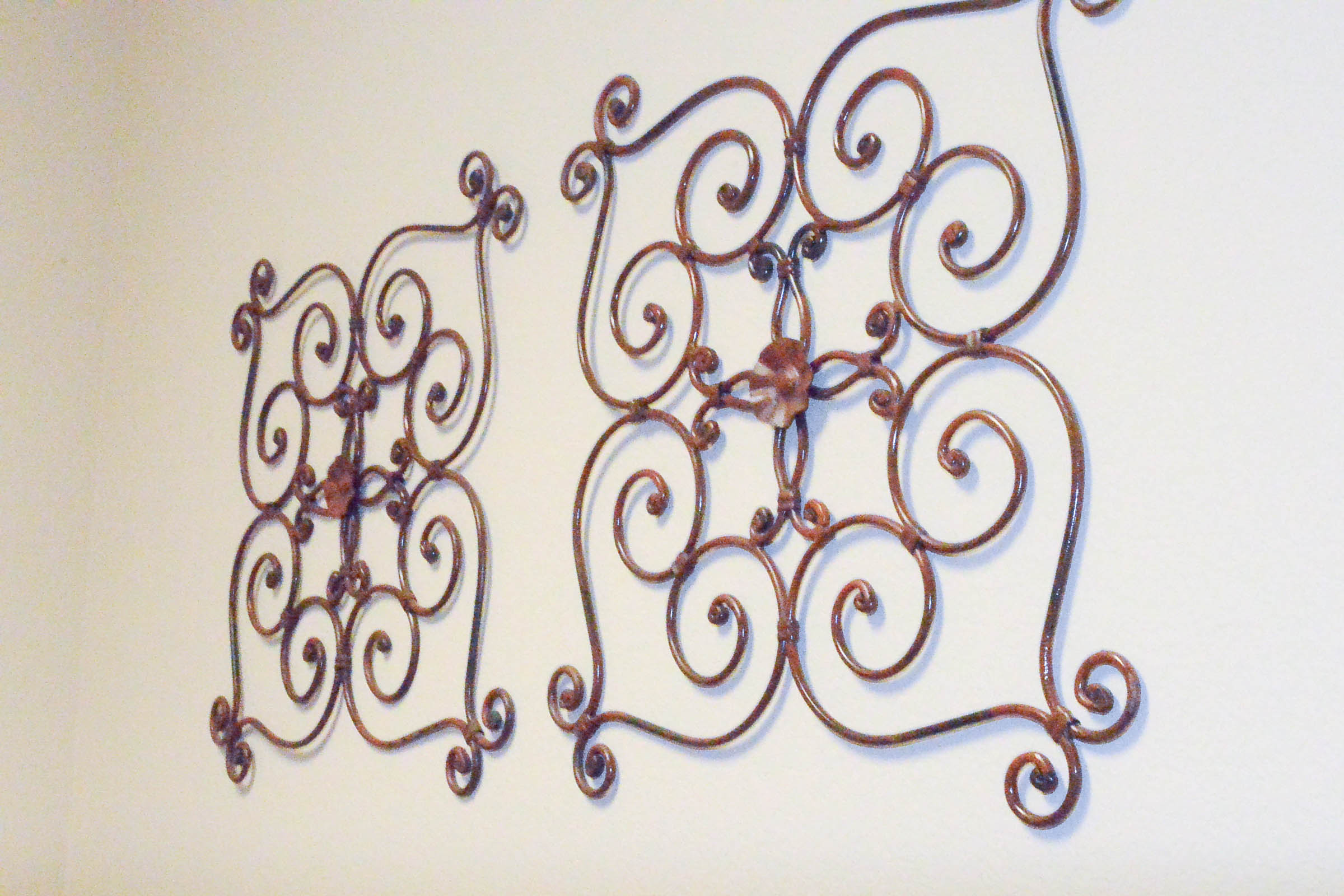 Pair of Wrought Metal Wall Hangings