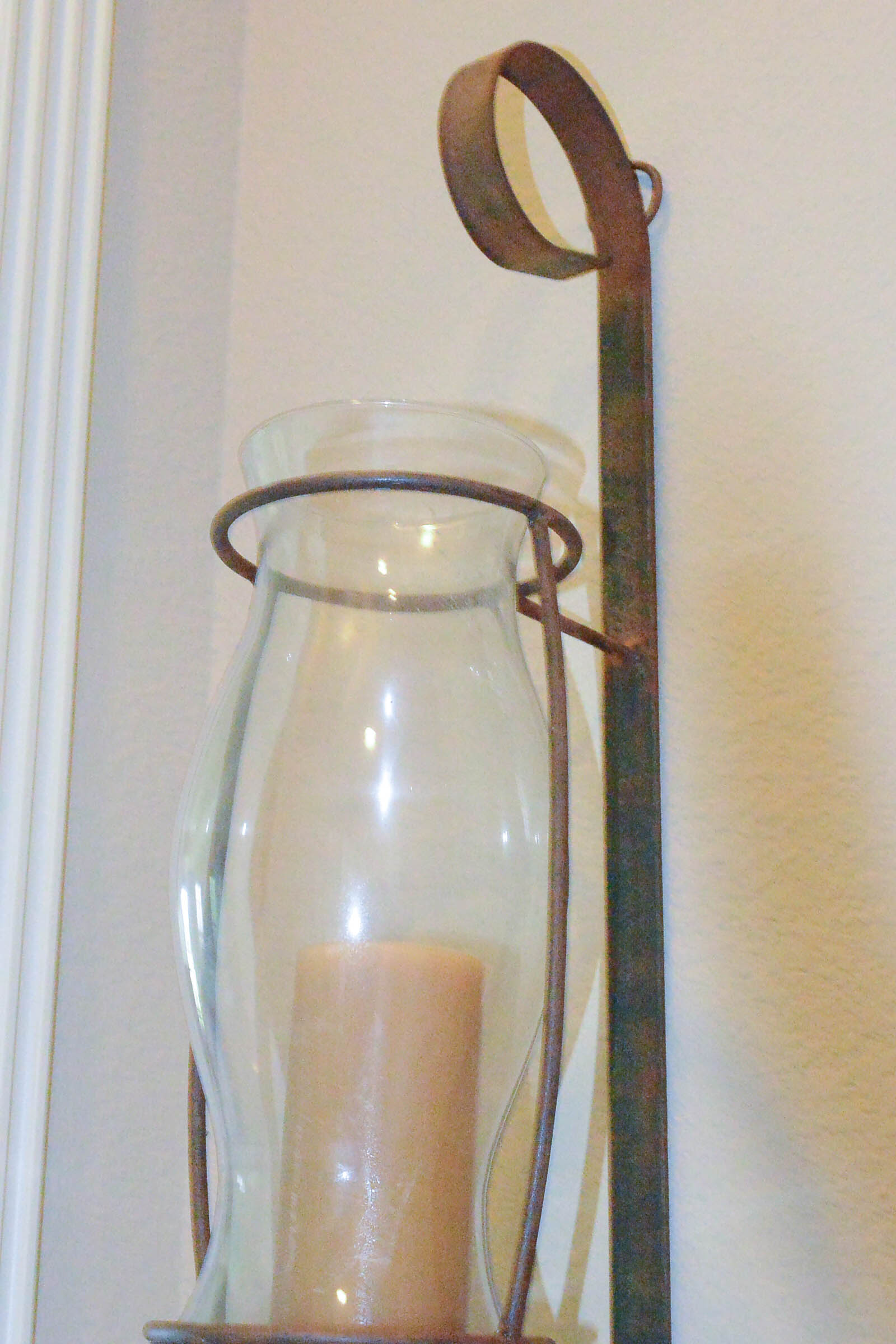 Pair of Large Wrought Metal and Glass Wall Sconces