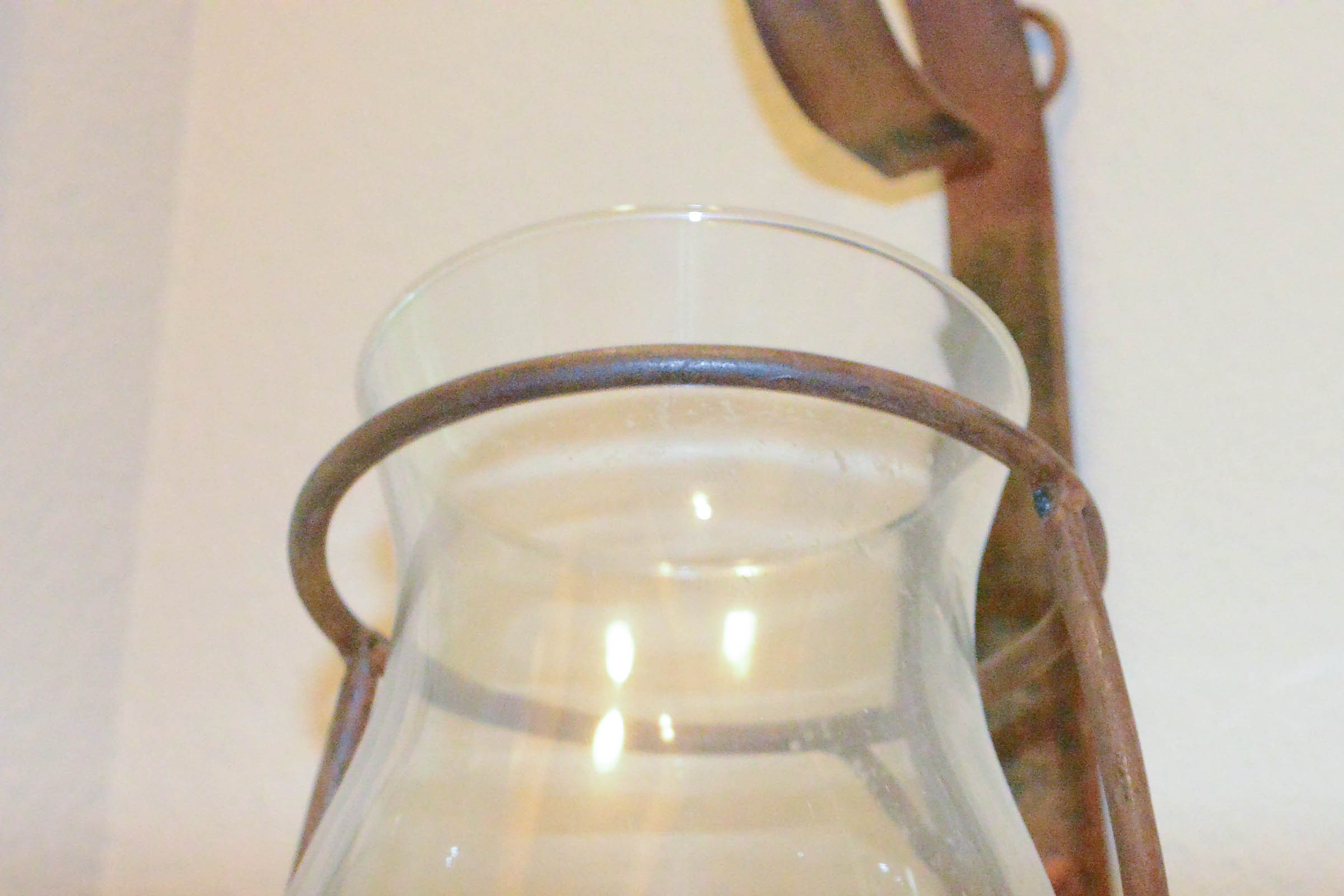 Pair of Large Wrought Metal and Glass Wall Sconces