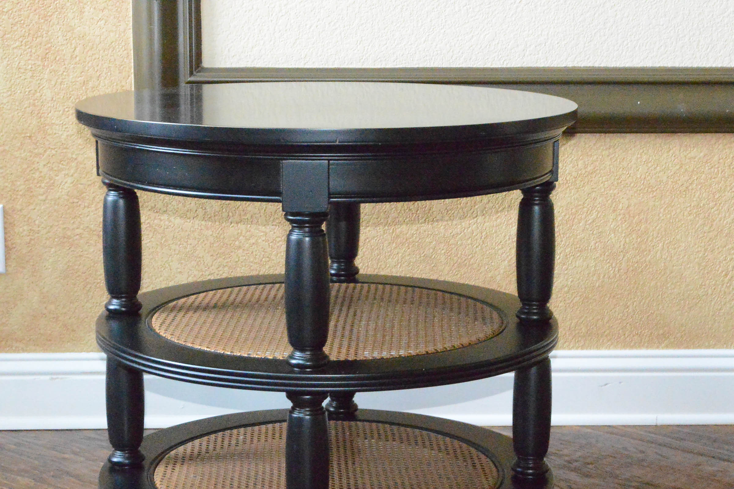 Round Wooden Accent Table with Cane Shelves