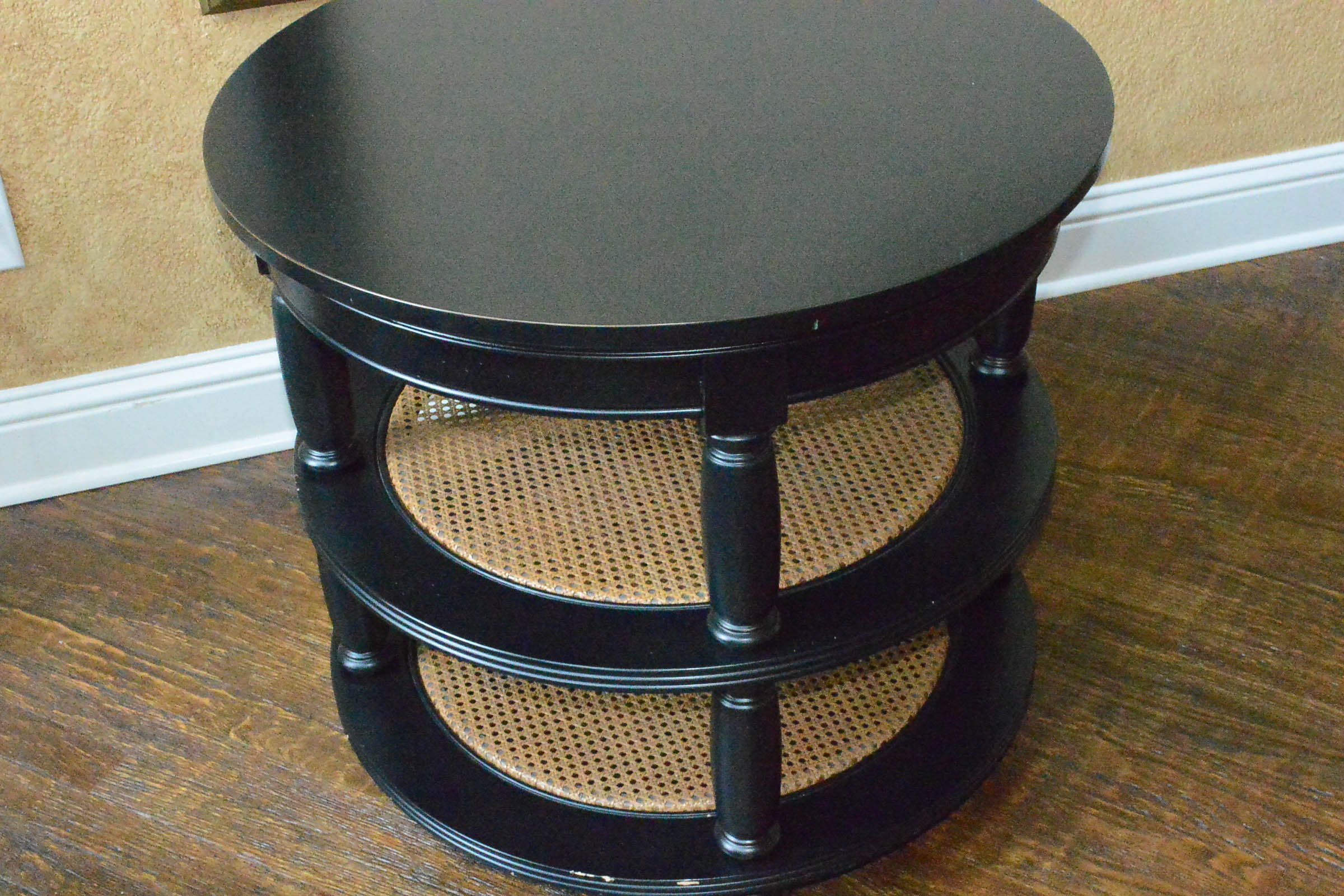 Round Wooden Accent Table with Cane Shelves