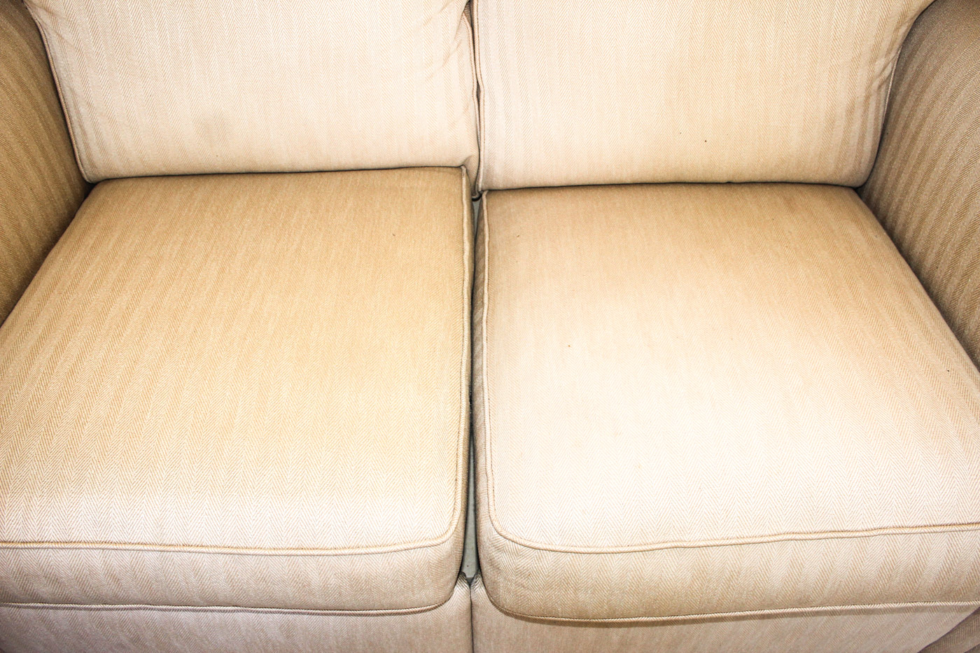 MotionCraft Reclining Loveseat Upholstered in Cream Herringbone