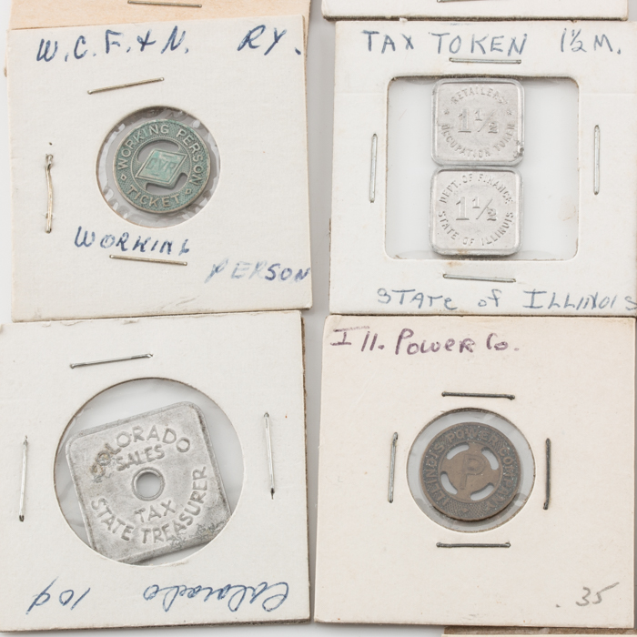 Group of Thirty-Four Tax and Transportation Tokens
