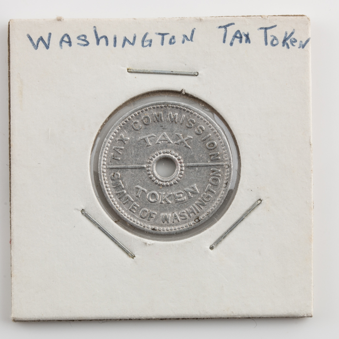 Group of Thirty-Four Tax and Transportation Tokens