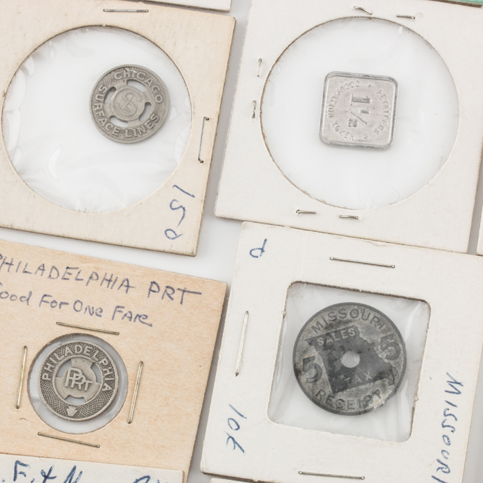 Group of Thirty-Four Tax and Transportation Tokens
