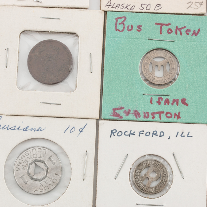 Group of Thirty-Four Tax and Transportation Tokens