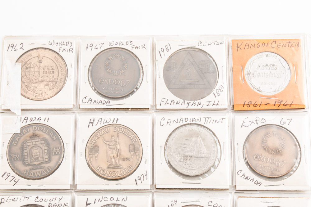 Two Album Pages of Commemorative Coins and Medals