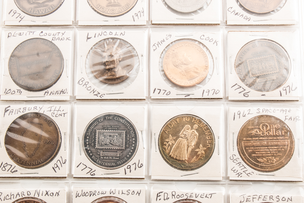 Two Album Pages of Commemorative Coins and Medals