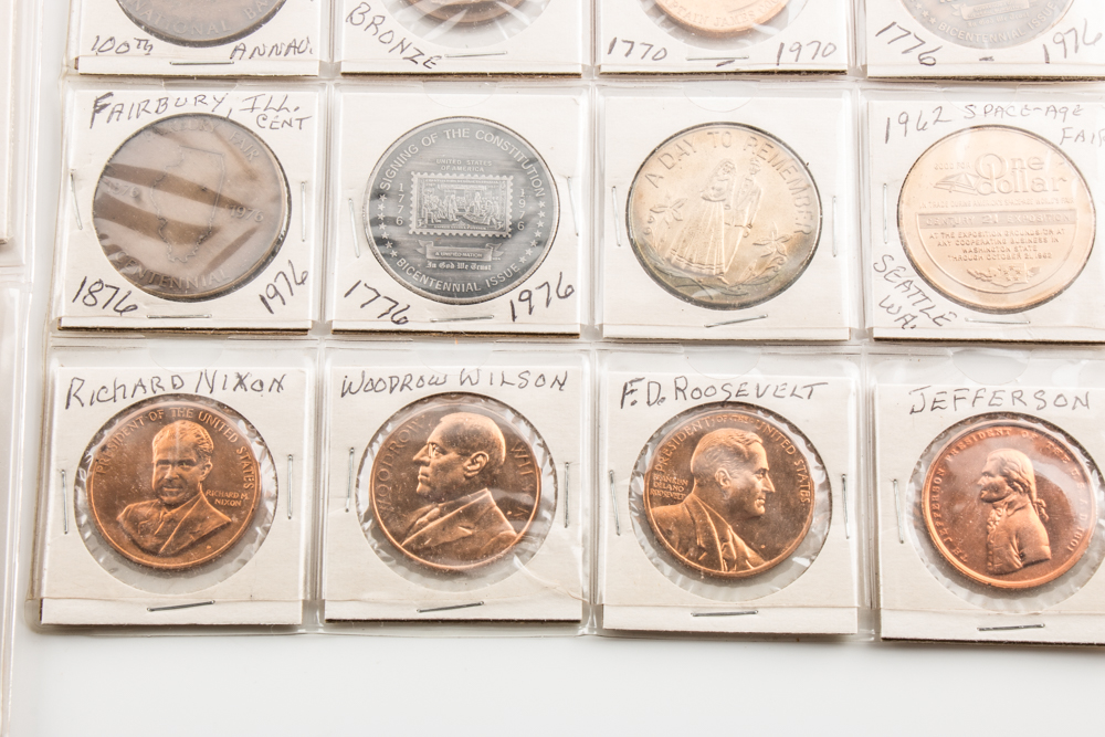 Two Album Pages of Commemorative Coins and Medals