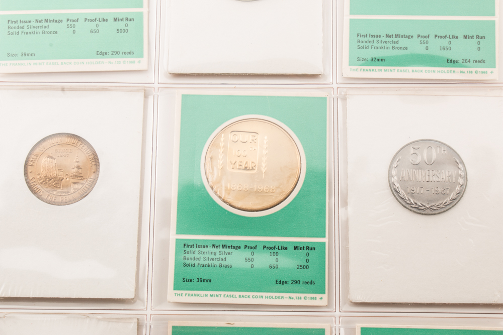Two Album Pages of Commemorative Coins and Medals