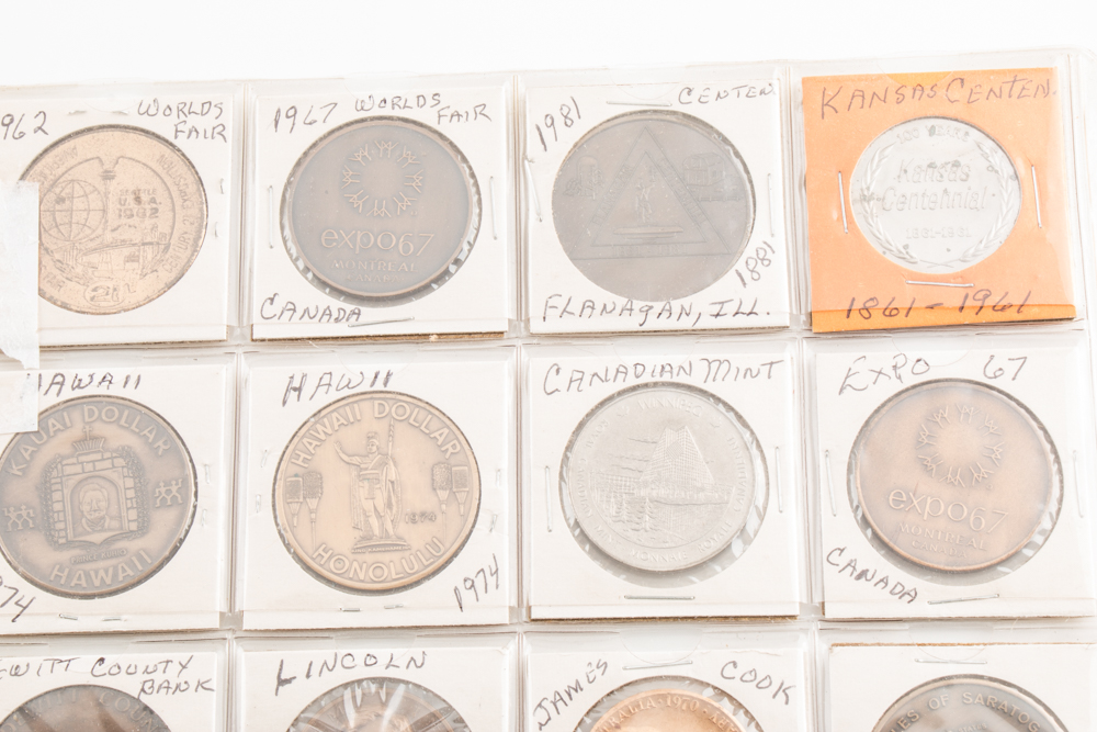 Two Album Pages of Commemorative Coins and Medals