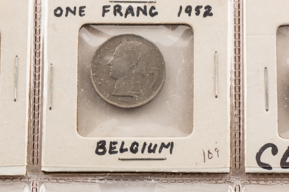 Album Page of Twenty Vintage and Antique Foreign Coins