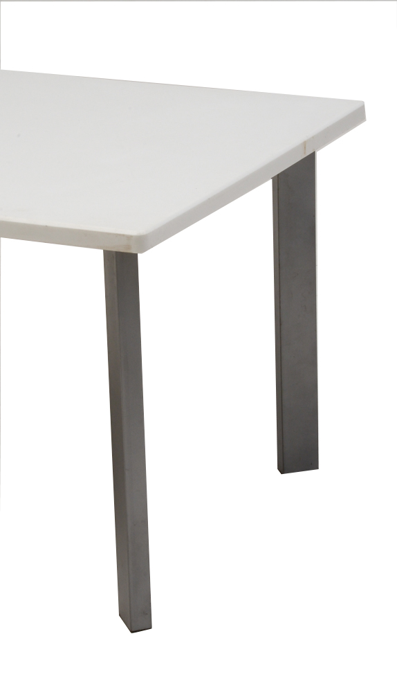 Table With White Top and Gray Metal Legs