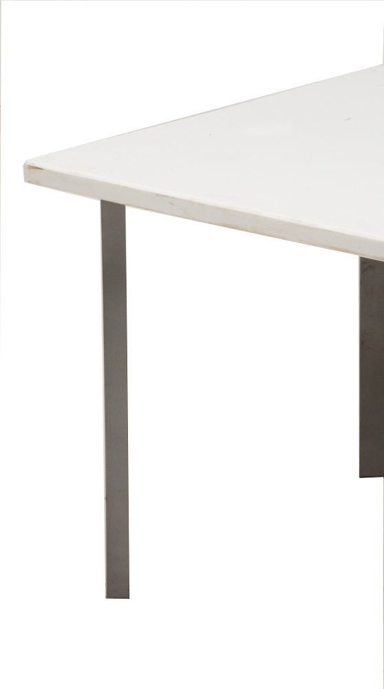 Table With White Top and Gray Metal Legs