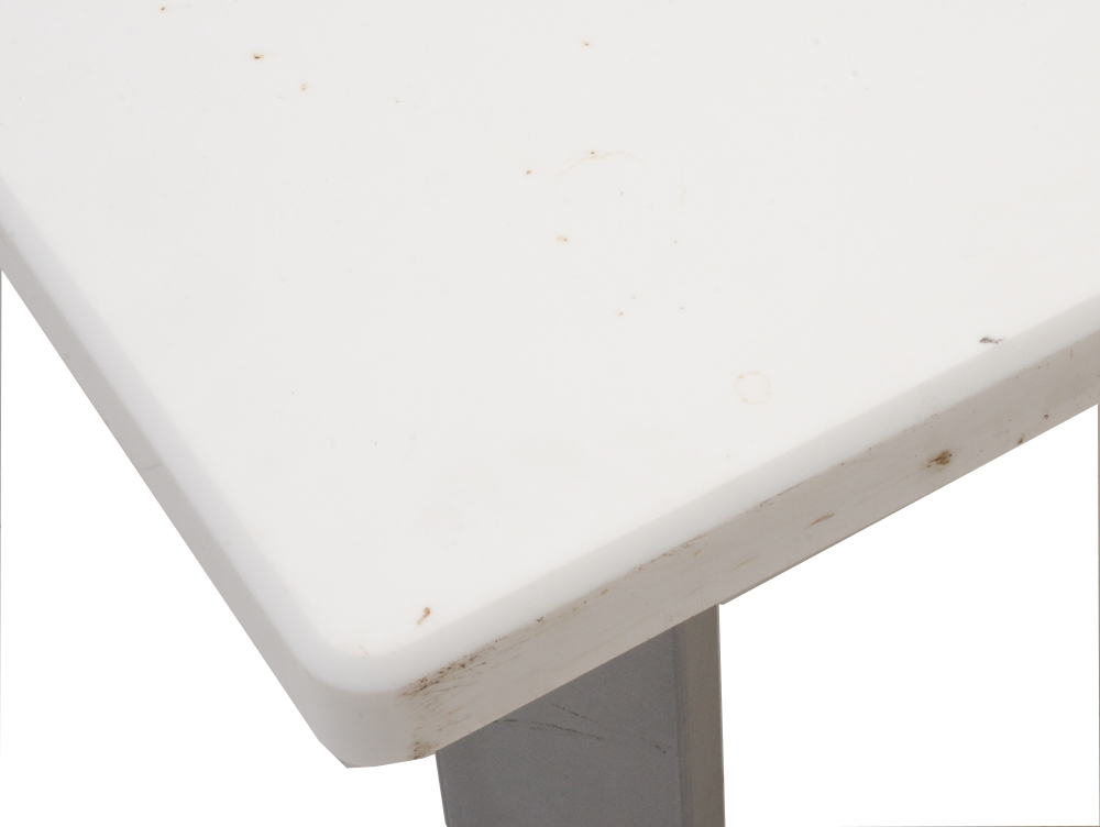 Table With White Top and Gray Metal Legs