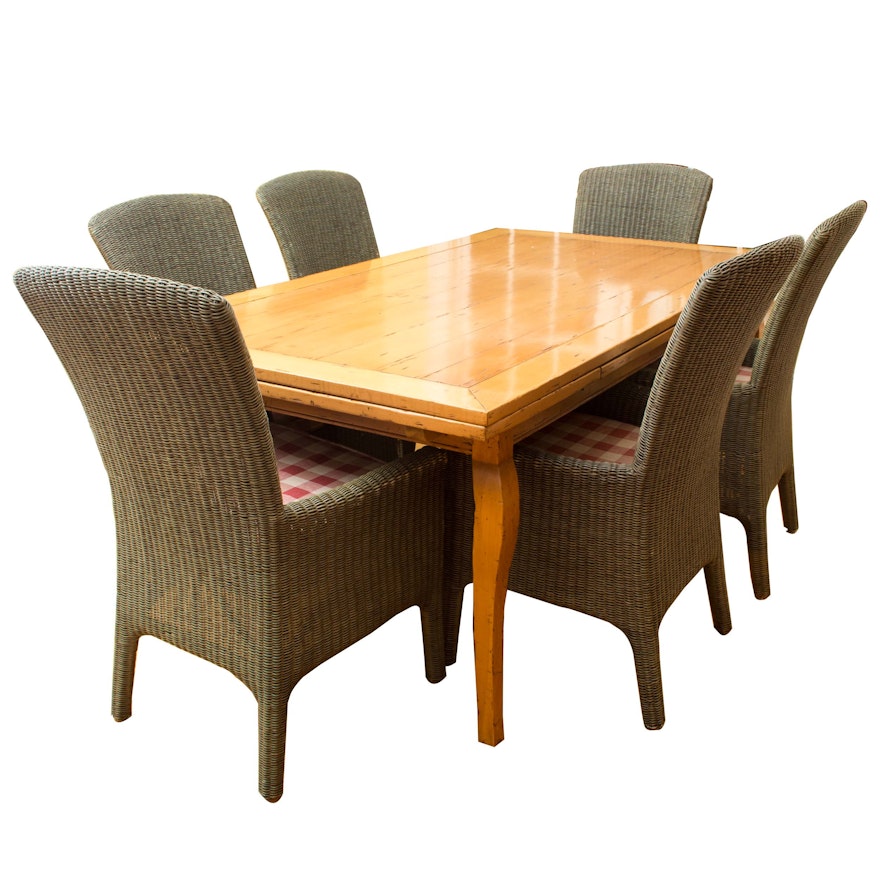 Contemporary Wooden Dining Table with Wicker Side Chairs