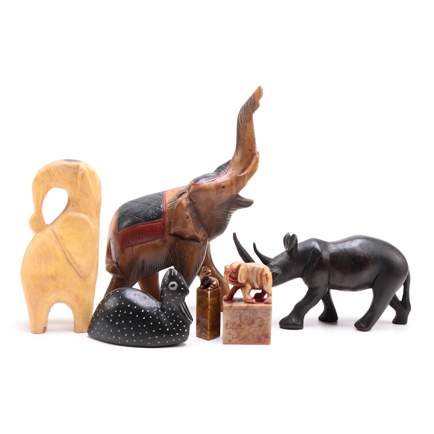 A Selection of Animal Themed Decor to Include Two Soapstone Carvings