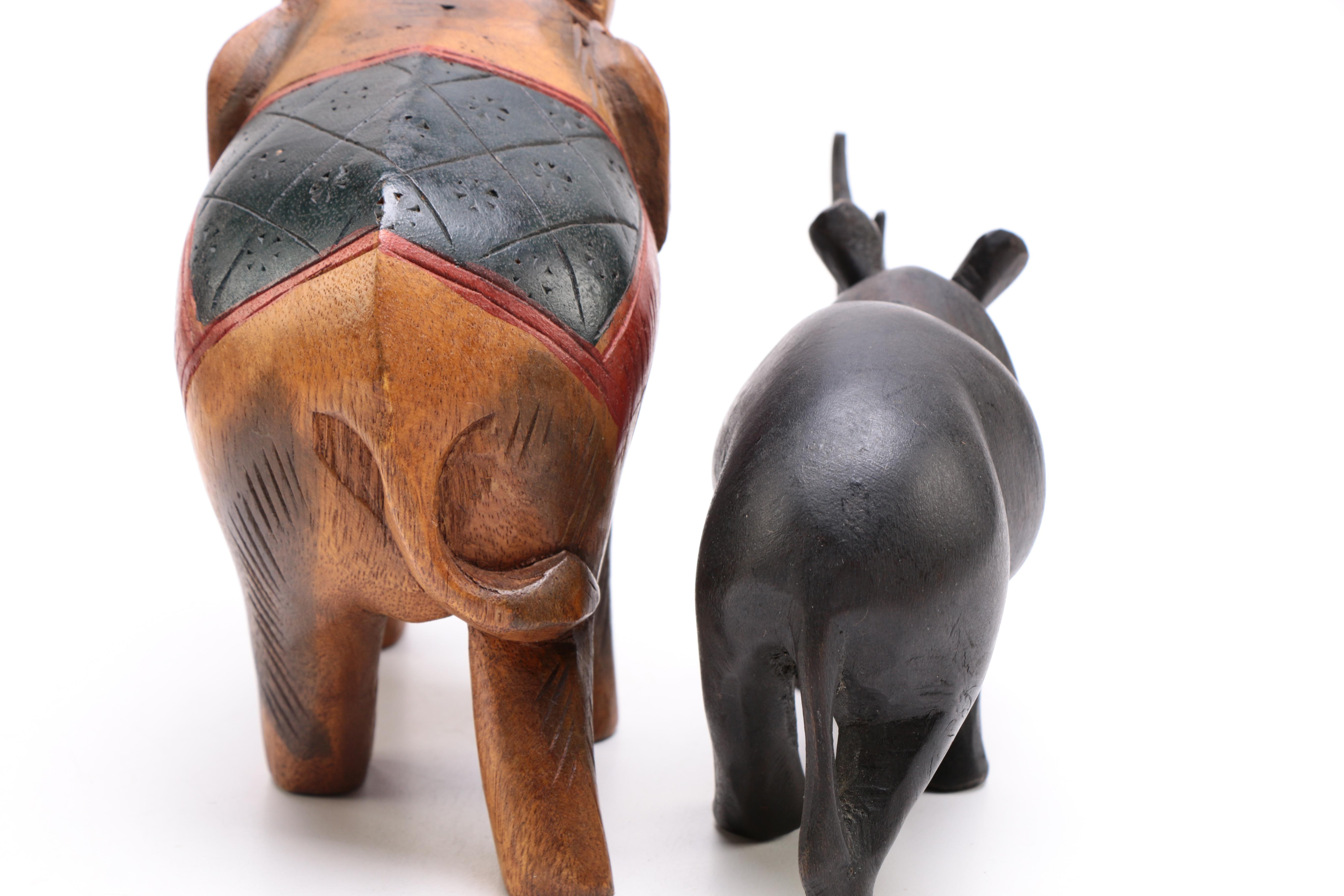 A Selection of Animal Themed Decor to Include Two Soapstone Carvings