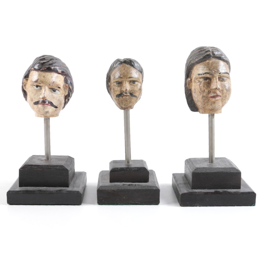 Wooden Heads on Stands