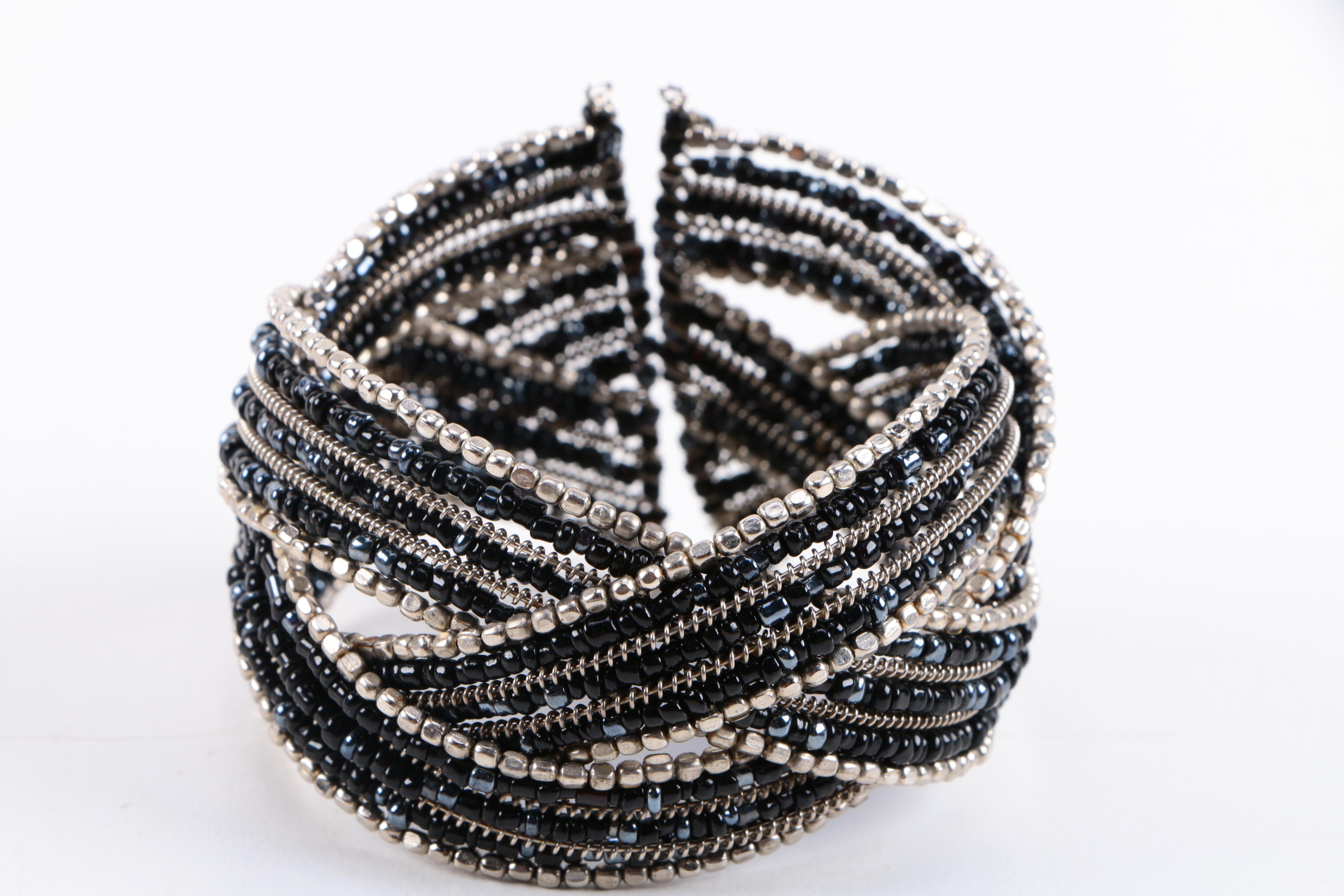 Assorted Costume Jewelry Including a Wing & Fire Bracelet