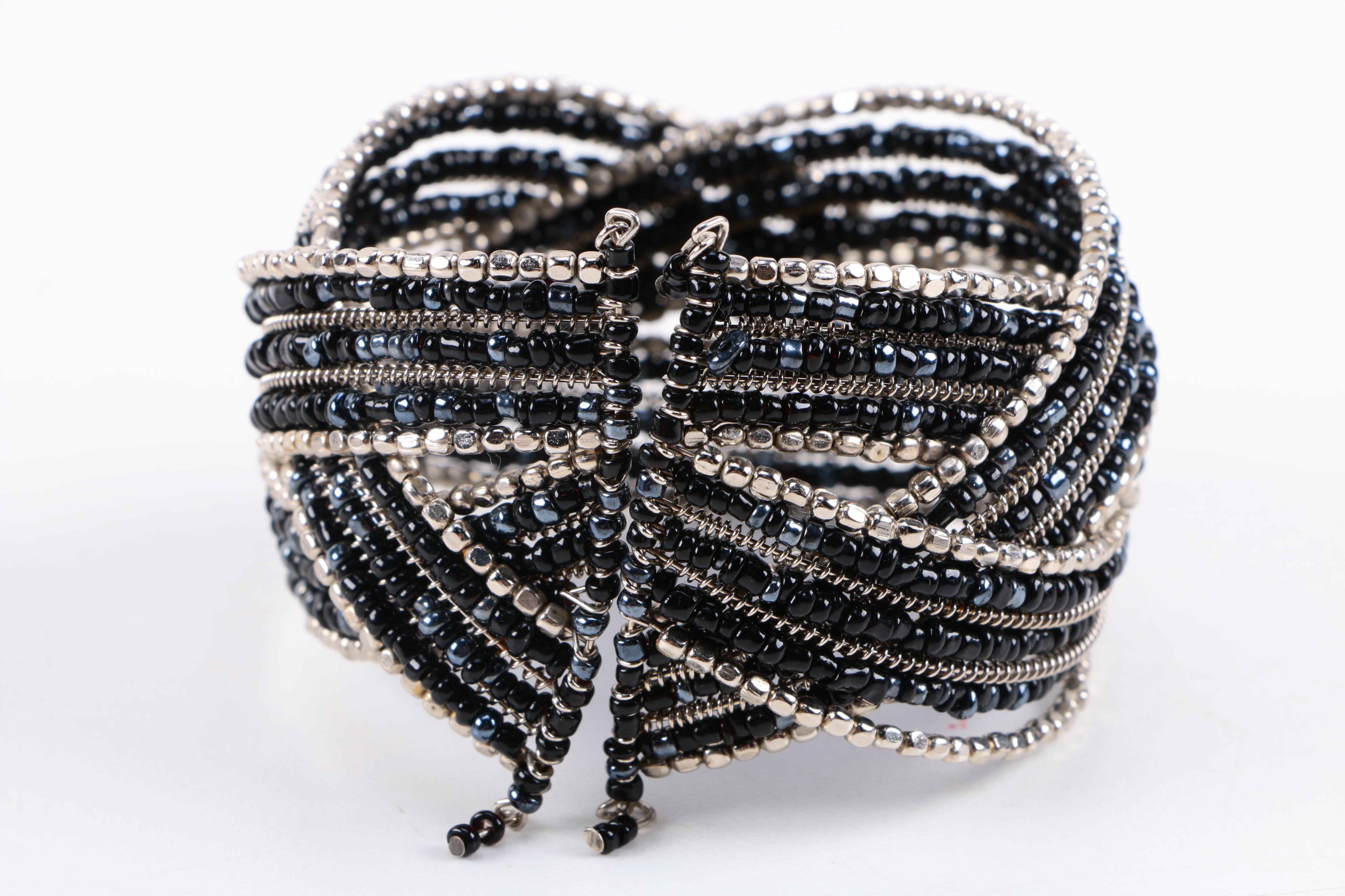 Assorted Costume Jewelry Including a Wing & Fire Bracelet