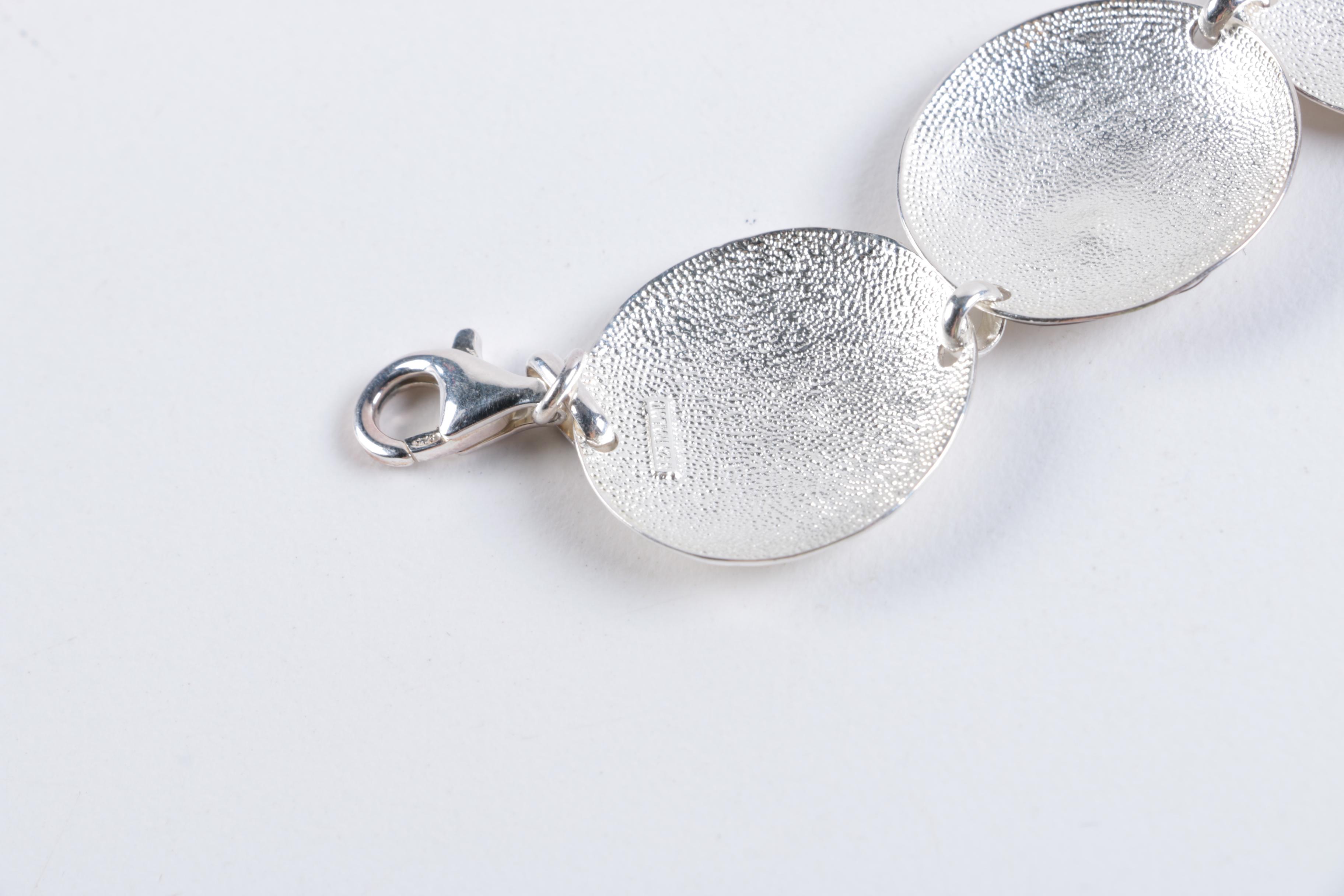 Sterling Silver Jewelry Including a Black Onyx Ring