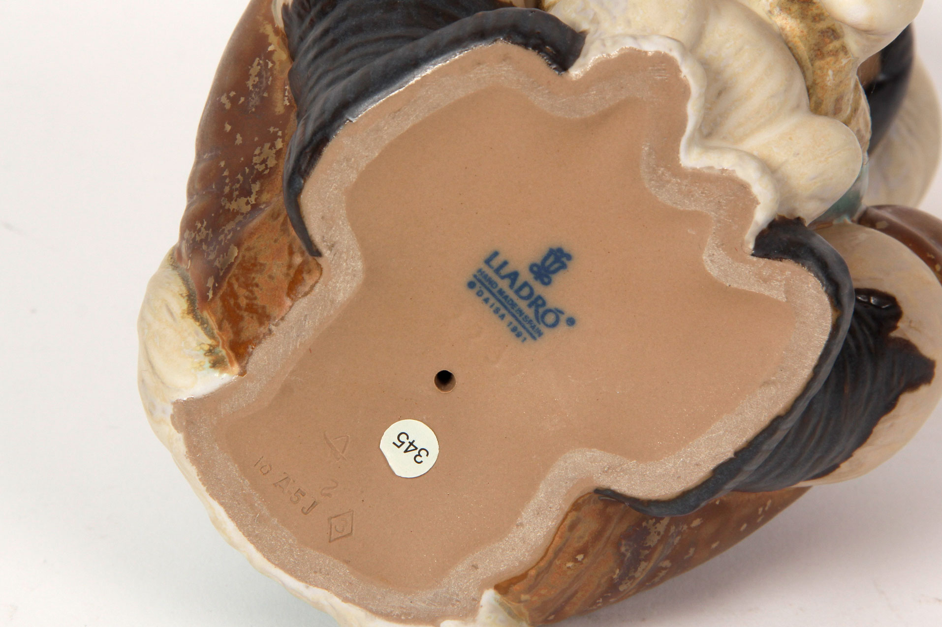 Lladró "Eskimo Girl with Polar Bear Cub" Figurine