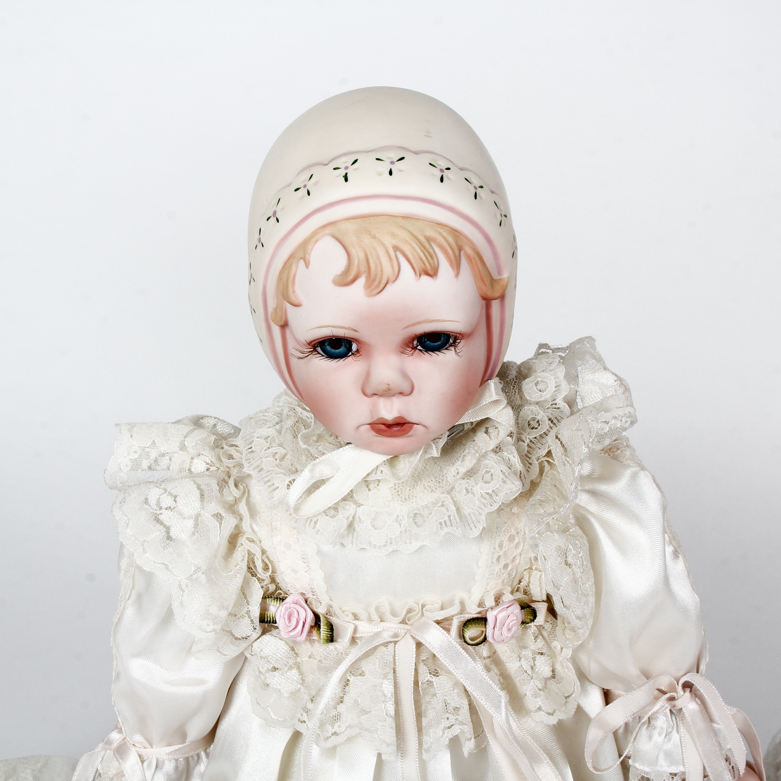 Pair of Vintage Porcelain Dolls