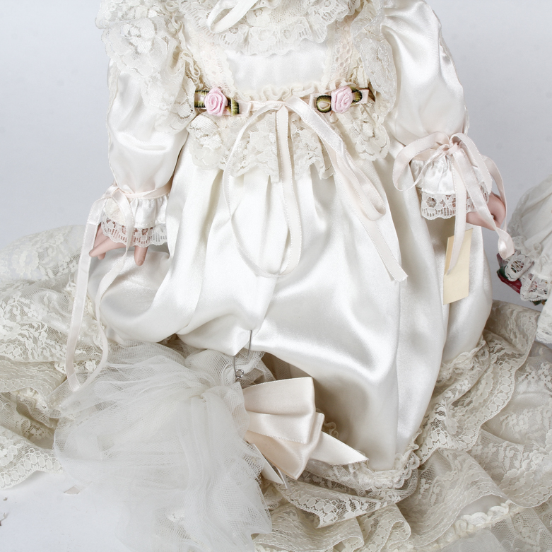 Pair of Vintage Porcelain Dolls