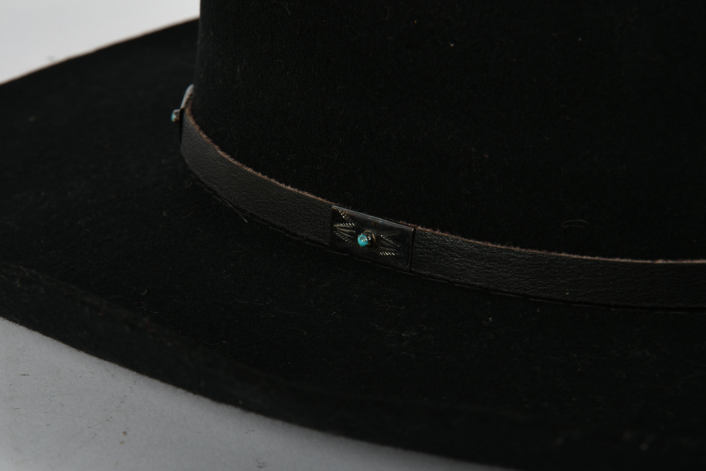 Pair of Cowboy Hats Featuring Stetson