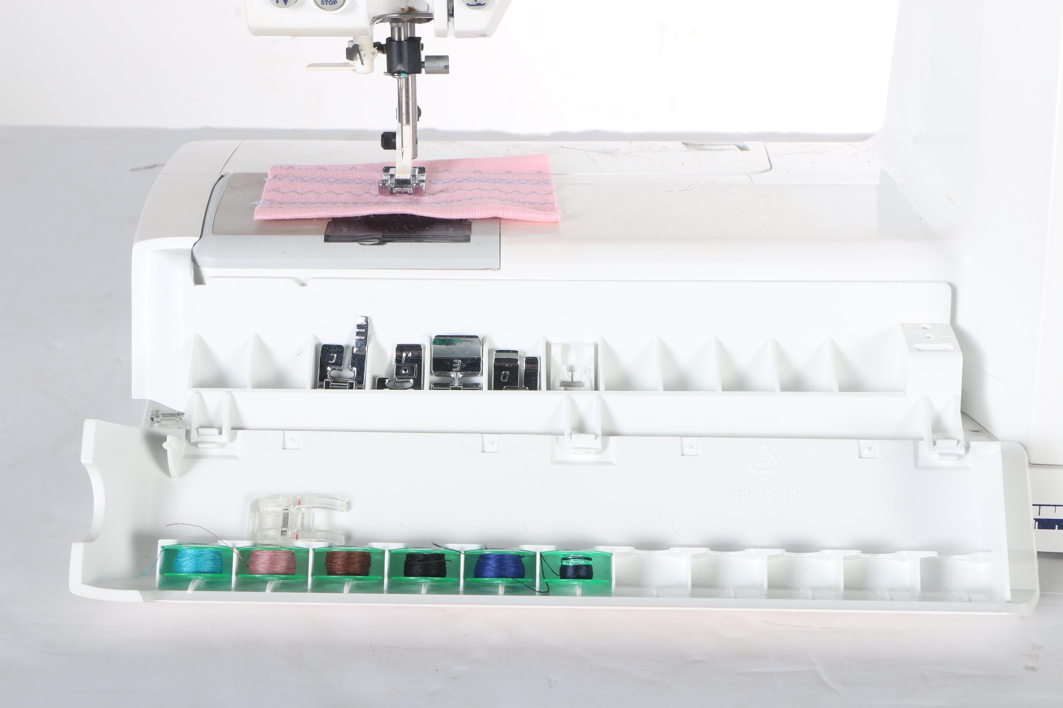 Two Husqvarna Viking Designer II Computerized Sewing Machines