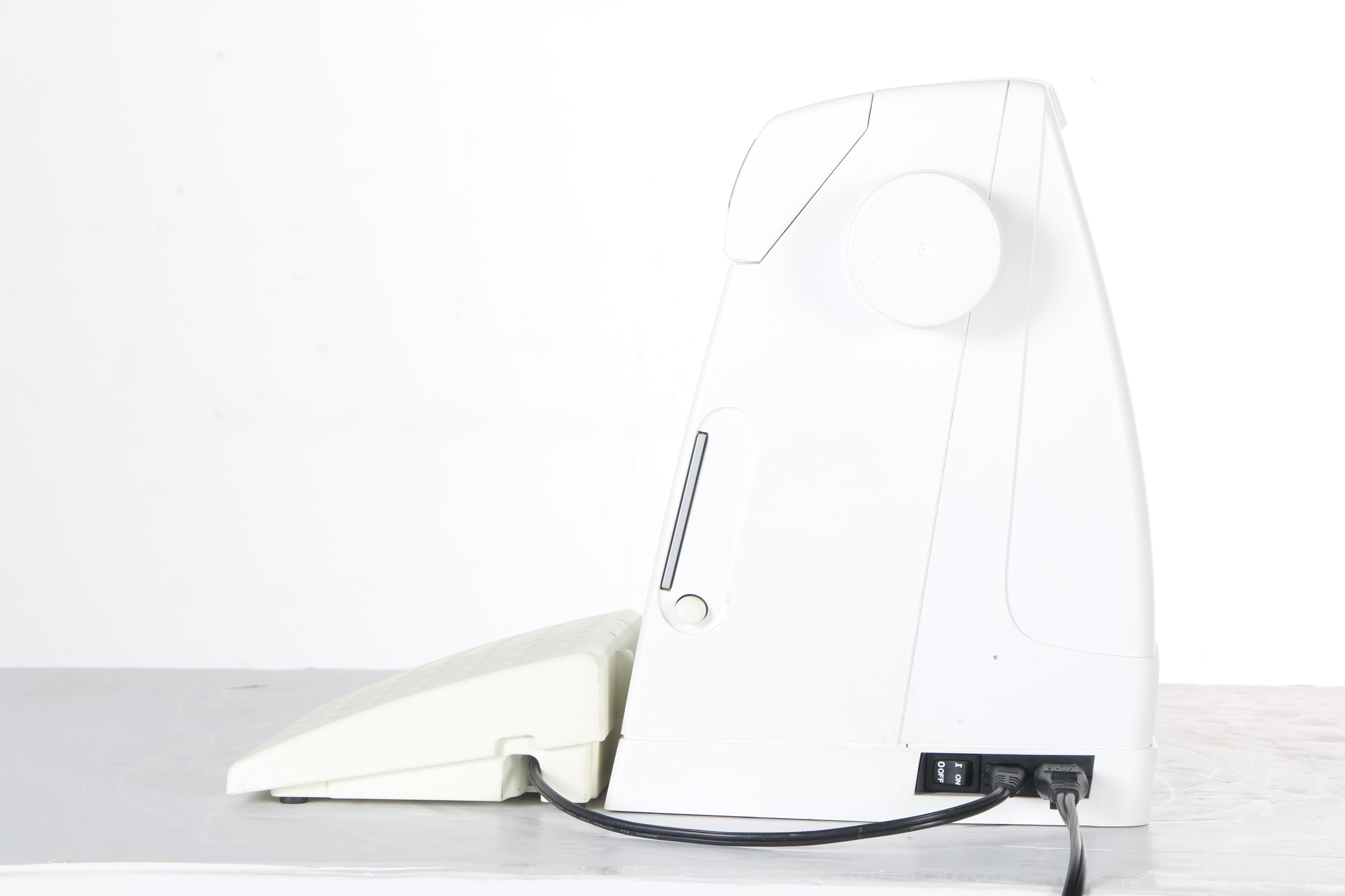 Two Husqvarna Viking Designer II Computerized Sewing Machines