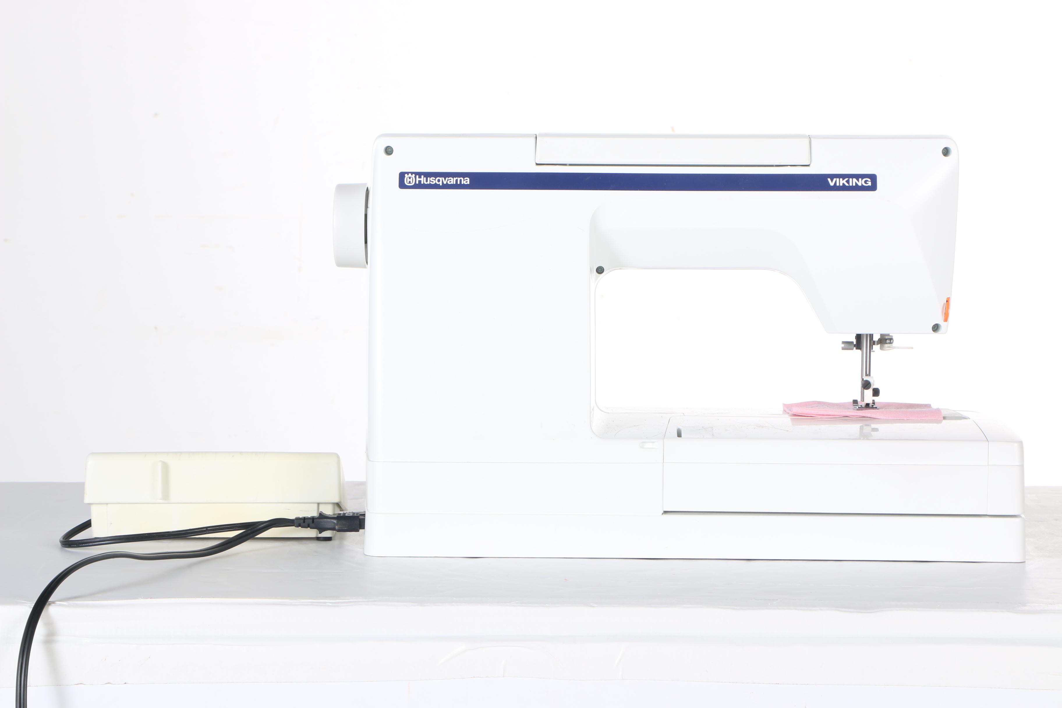 Two Husqvarna Viking Designer II Computerized Sewing Machines