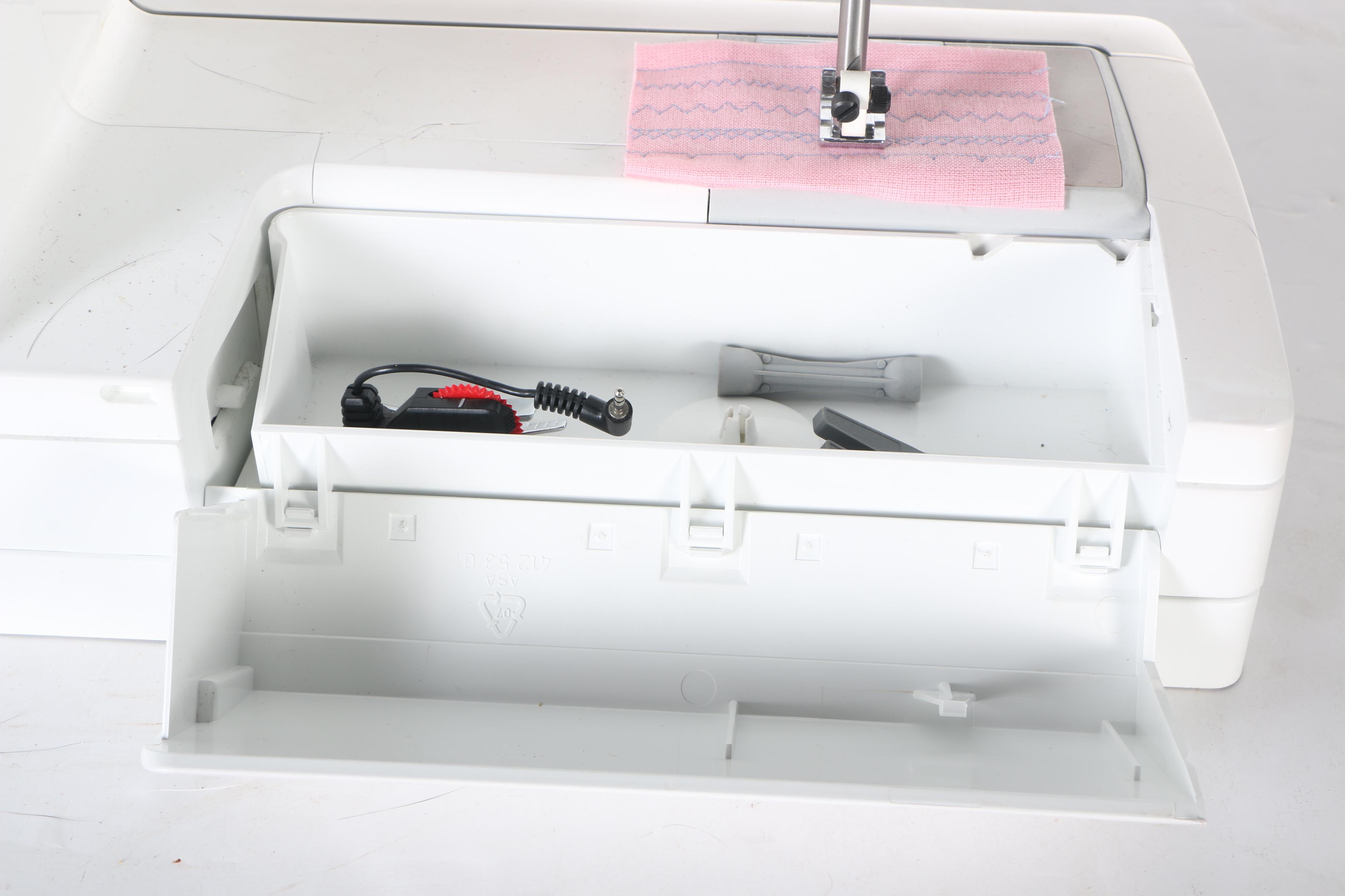 Two Husqvarna Viking Designer II Computerized Sewing Machines